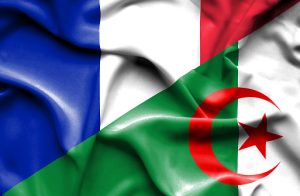 Waving flag of Algeria and France